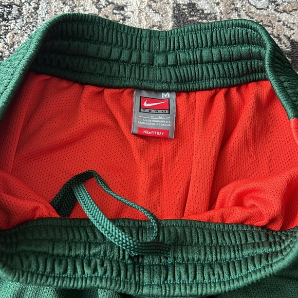 Nike sz Md University of Miami green and orange basketball shorts with pockets - Picture 2 of 5